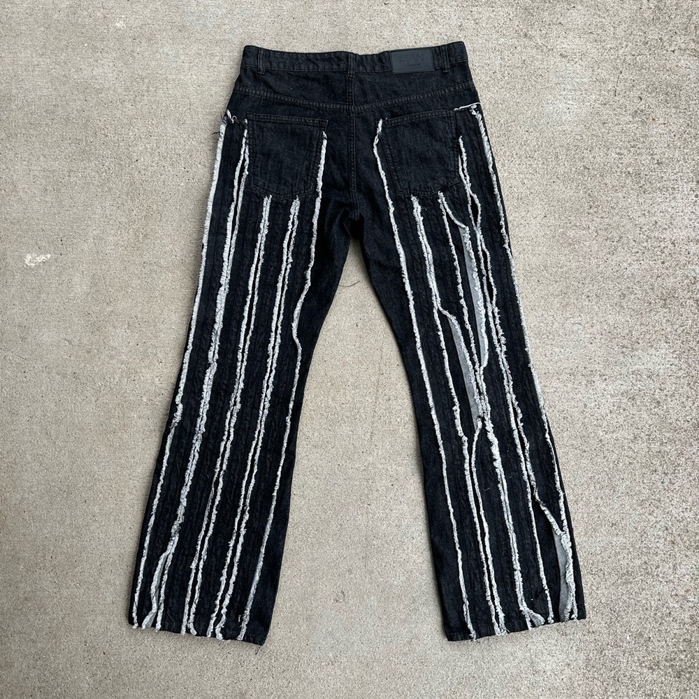 Extreme Distressed Bootcut Jeans